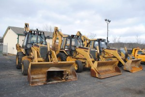 Heavy equipment - Municipal backhoes sold at a 2015 M & W auction.