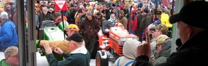 photo of the 2014 Voelker spring auction Scott Vander Kolk Jr. sells a tractor